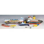 A TM Japan tinplate battery powered tugboat 'Neptune', length 38cm, together with three Camphor-