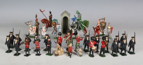 A collection of hollow cast lead figures, including mariners and knights (playwear).Buyer’s