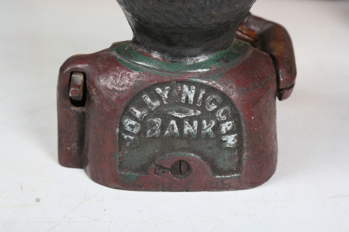 A cast metal money box in the form of a man's head, together with a painted wooden pull-along toy - Image 3 of 10