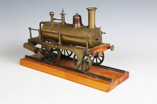 A scratch-built brass 2½ inch gauge 0-4-0 steam locomotive, the outside cylinders driving the rear