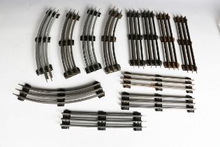 A collection of Lionel gauge O three-rail curves and short straight track.Buyer’s Premium 29.4% (