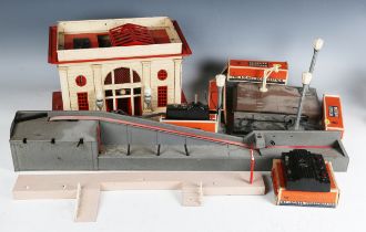 A collection of Lionel gauge O railway accessories, including tinplate station 'Lionel City',