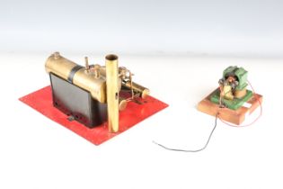 A Bowman Models steam plant with brass boiler with safety valve and chimney, with associated burner,