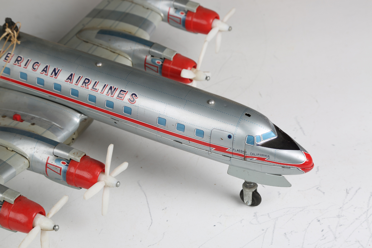 A Yonezawa tinplate battery operated Multi-Act DC-7C plane 'American Airlines' with moving - Image 7 of 8