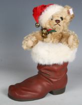 A Steiff limited No. 670862 Teddy Bear in a Boot, boxed with certificate.Buyer’s Premium 29.4% (
