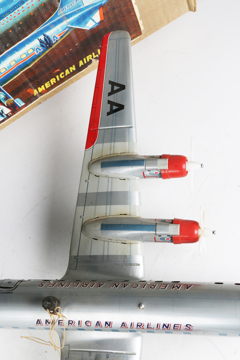 A Yonezawa tinplate battery operated Multi-Act DC-7C plane 'American Airlines' with moving - Image 4 of 8