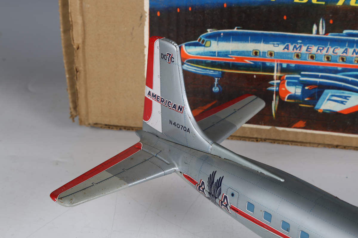 A Yonezawa tinplate battery operated Multi-Act DC-7C plane 'American Airlines' with moving - Image 5 of 8