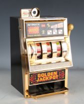 A Waco toy Automatic Jackpot one-arm bandit slot machine.Buyer’s Premium 29.4% (including VAT @ 20%)
