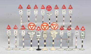 A collection of diecast metal road signs, zebra crossing lights and figures (playwear).Buyer’s