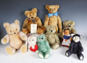 A Steiff No. 663741 Krystina teddy bear, two other Steiff teddy bears, a rabbit and a Micki
