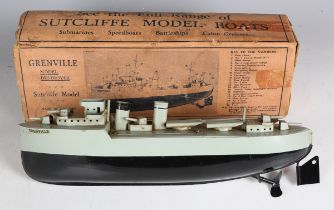 A Sutcliffe tinplate clockwork 'Grenville' model destroyer with five deck guns, torpedo tubes and