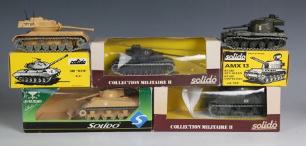 Twelve Solido tanks, including No. 6077 Sherman bulldozer, Patton M-47 and AMX 13, five boxed, and