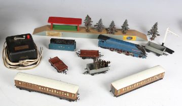 A collection of Hornby Dublo three-rail items, including locomotive 'Sir Nigel Gresley' and