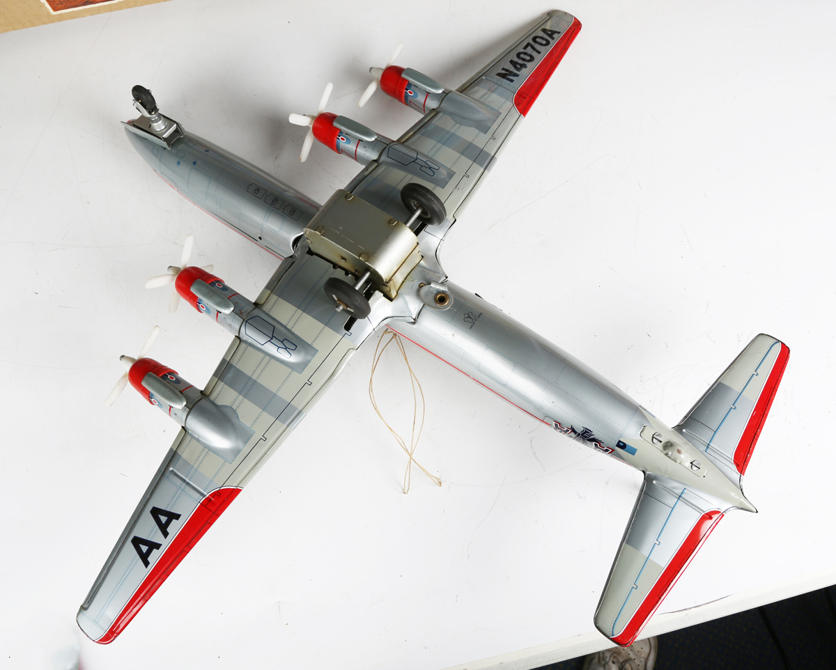 A Yonezawa tinplate battery operated Multi-Act DC-7C plane 'American Airlines' with moving - Image 3 of 8