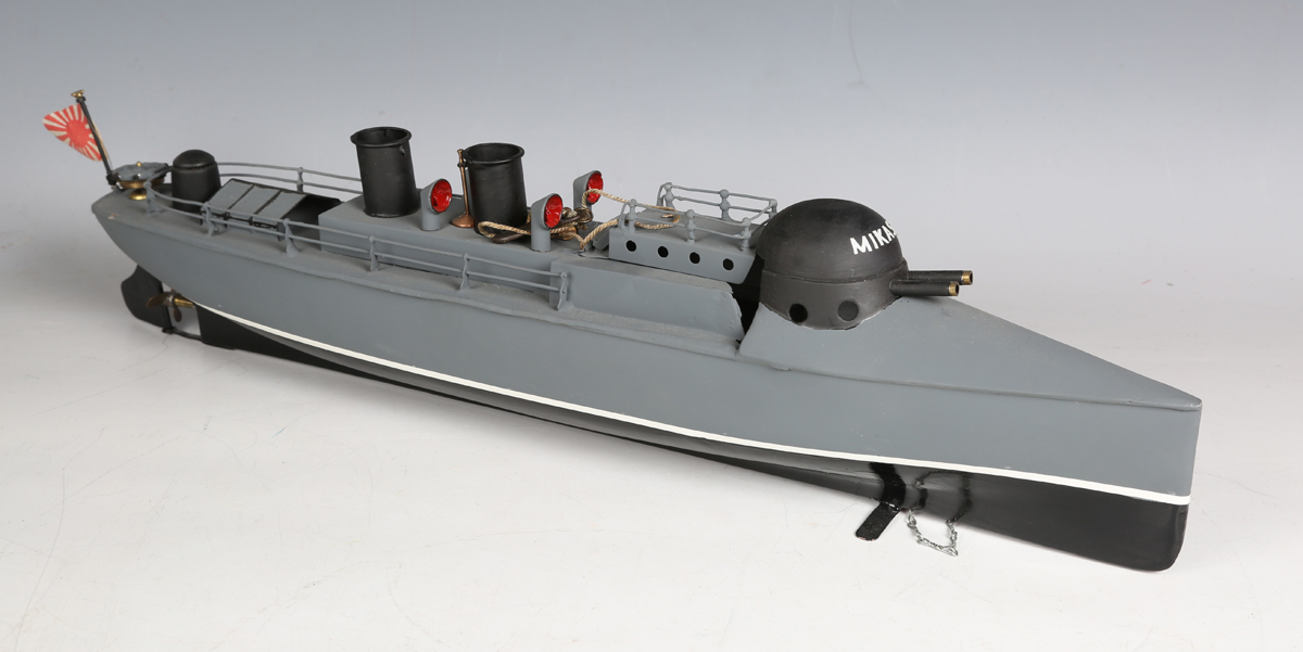A Bing type tinplate clockwork gunboat 'Mikasa', with two funnels, gun turret and hinged raised deck
