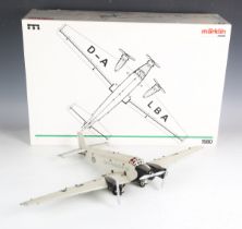 A Märklin No. 1980 Junkers JU52 tinplate model aeroplane, boxed.Buyer’s Premium 29.4% (including VAT