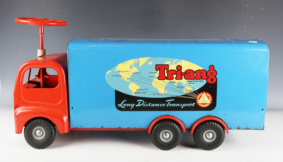 A Tri-ang pressed steel sit-on Long Distance Transport lorry, finished in red and blue, length - Image 4 of 6