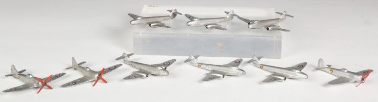 A Dinky Toys 70E set of six Meteor twin jet fighters and three No. 70B Hawker Tempest fighters, with