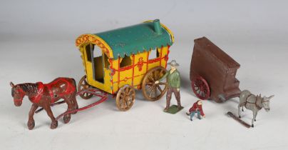 A Taylor & Barrett gypsy caravan and horse, a diecast organ, grinder and monkey, and a Britains