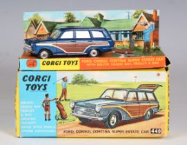 A Corgi Toys No. 440 Ford Consul Cortina Super estate car, boxed, with golfer and caddie boy (box