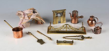 A Victorian doll's bonnet and a group of copper and brass doll's house items, including two fenders,