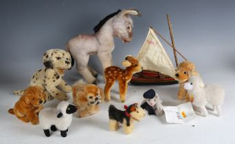 Ten Steiff soft toys, including No. 670800 Deutschlandbär 2001, Flori and donkey.Buyer’s Premium