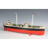 A Fleischmann US Zone tinplate clockwork single funnel 'Esso' tanker with black and red hull, length