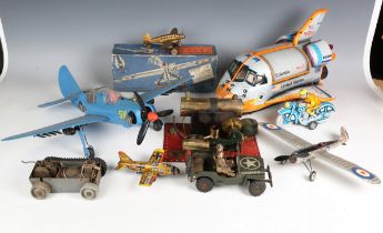 A collection of tinplate clockwork and mechanical toys, including an Arnold Jeep, Brimtoy double