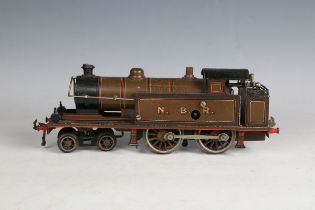 A Bing gauge O clockwork 4-4-0 tank locomotive in NBR brown and black (some paint chips, crazing and