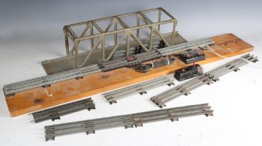 A collection of Lionel gauge O three-rail curves and short straight track.Buyer’s Premium 29.4% (