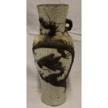 A 19th century Japanese pottery tapered vase with raised dragon decoration on crackled ground,