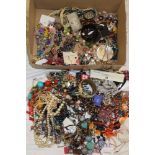 A box containing a large selection of mixed costume jewellery
