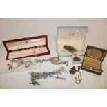 A selection of various mixed costume jewellery including necklaces, brooches,
