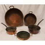 Two 19th century copper circular cooking pans with iron strap handles,