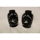 A pair of Victorian black-tinted glass spill vases with opaline bird and floral decoration 4" high