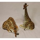 Two Russian china figures of giraffes 12" high and 10" long