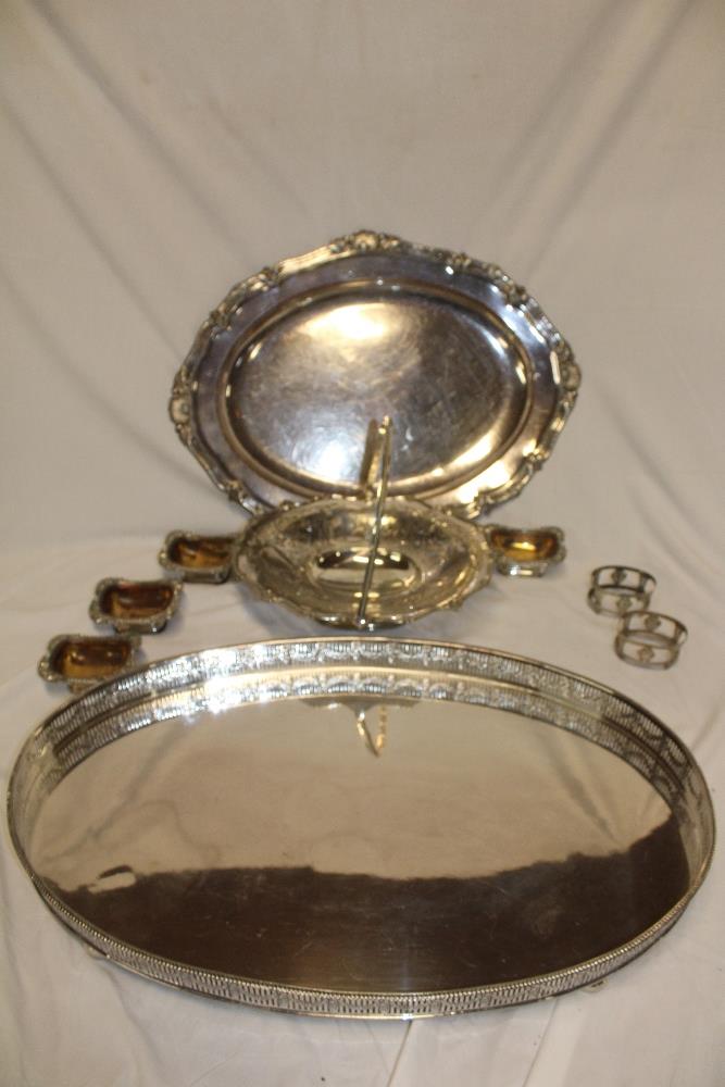 A large silver plated oval tea tray with pierced gallery,