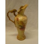 A Royal Worcester china blush ivory floral decorated ornamental jug with scroll handle,