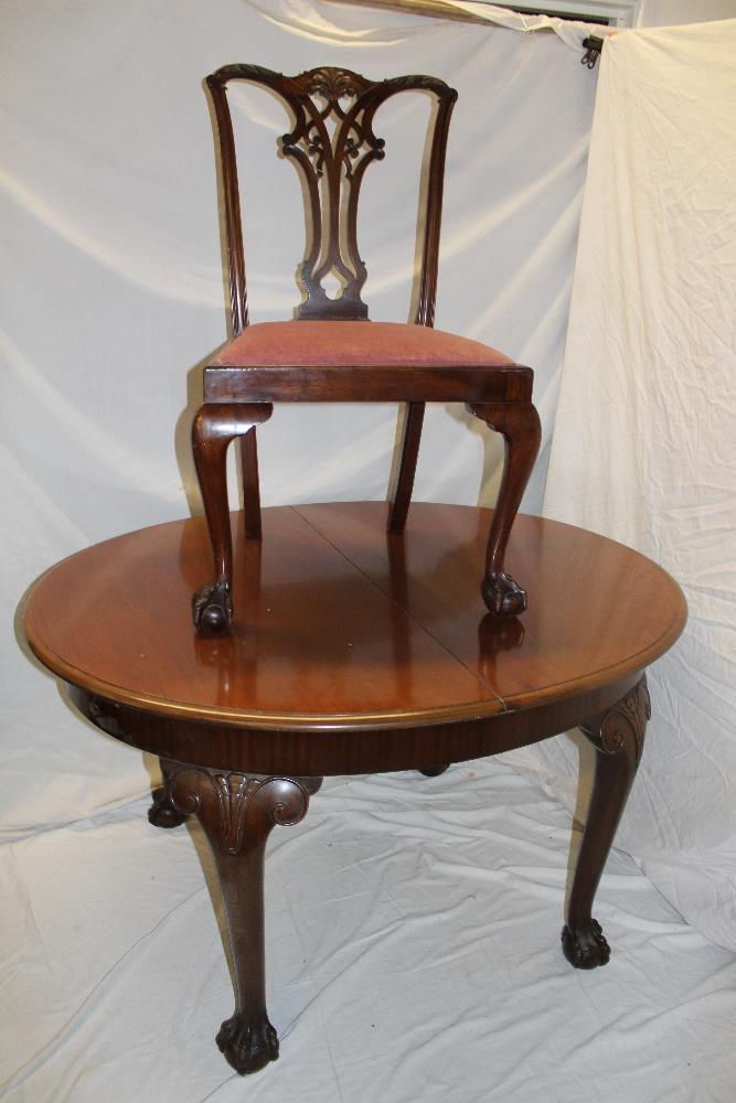 A good quality 1920's mahogany dining suite by Waring and Gillow comprising an oval extending