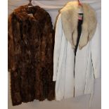 An American white leather and white fur three-quarter length coat and a Canadian fur coat (2)