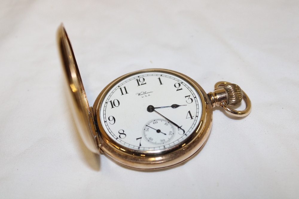 A gentleman's pocket watch by Waltham with enamelled circular dial and gold plated case