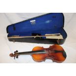 A German violin with 14" figured two-piece back in fitted case with bow
