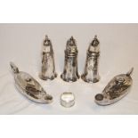 Three matching silver plated sugar casters with engraved RAF badges and a pair of silver plated