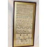 A Victorian needlework sampler depicting alphabet, letters and text by Harriet Wills,