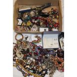 A box containing a large selection of mixed costume jewellery