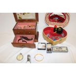 Two jewellery boxes containing costume jewellery,