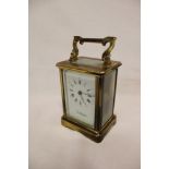 A good quality carriage clock by Wellington in brass traditional case