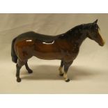 A Beswick china figure of a brown horse "Quarter Horse"