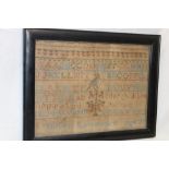 A 19th century needlework rectangular sampler depicting alphabet and numbers by Helen Lawrence aged