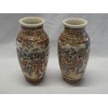 A pair of Japanese Satsuma pottery tapered vases with figure and landscape decoration, signed,